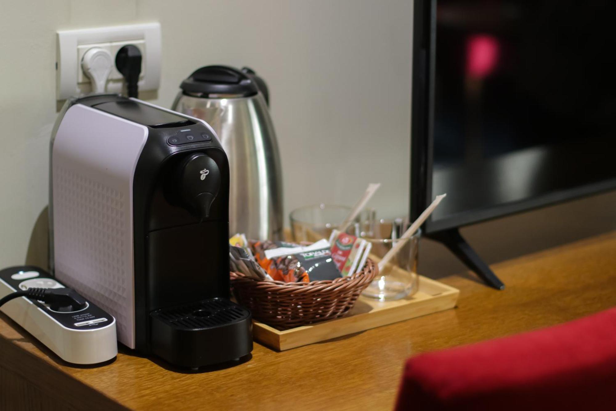 Opus Villa Sinaia Exterior photo A Nespresso coffee machine in a hotel room