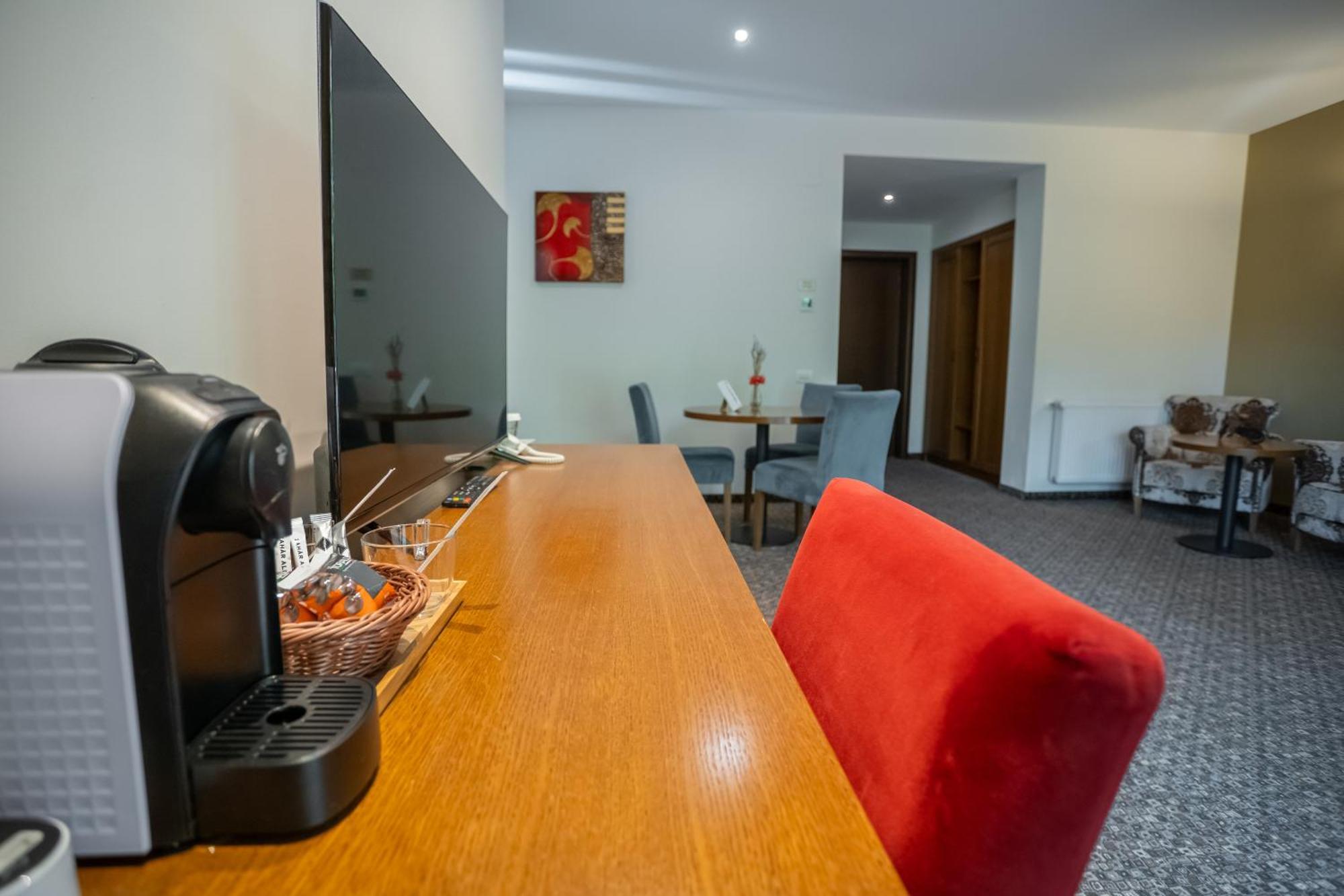 Opus Villa Sinaia Exterior photo A Nespresso machine in a hotel room
